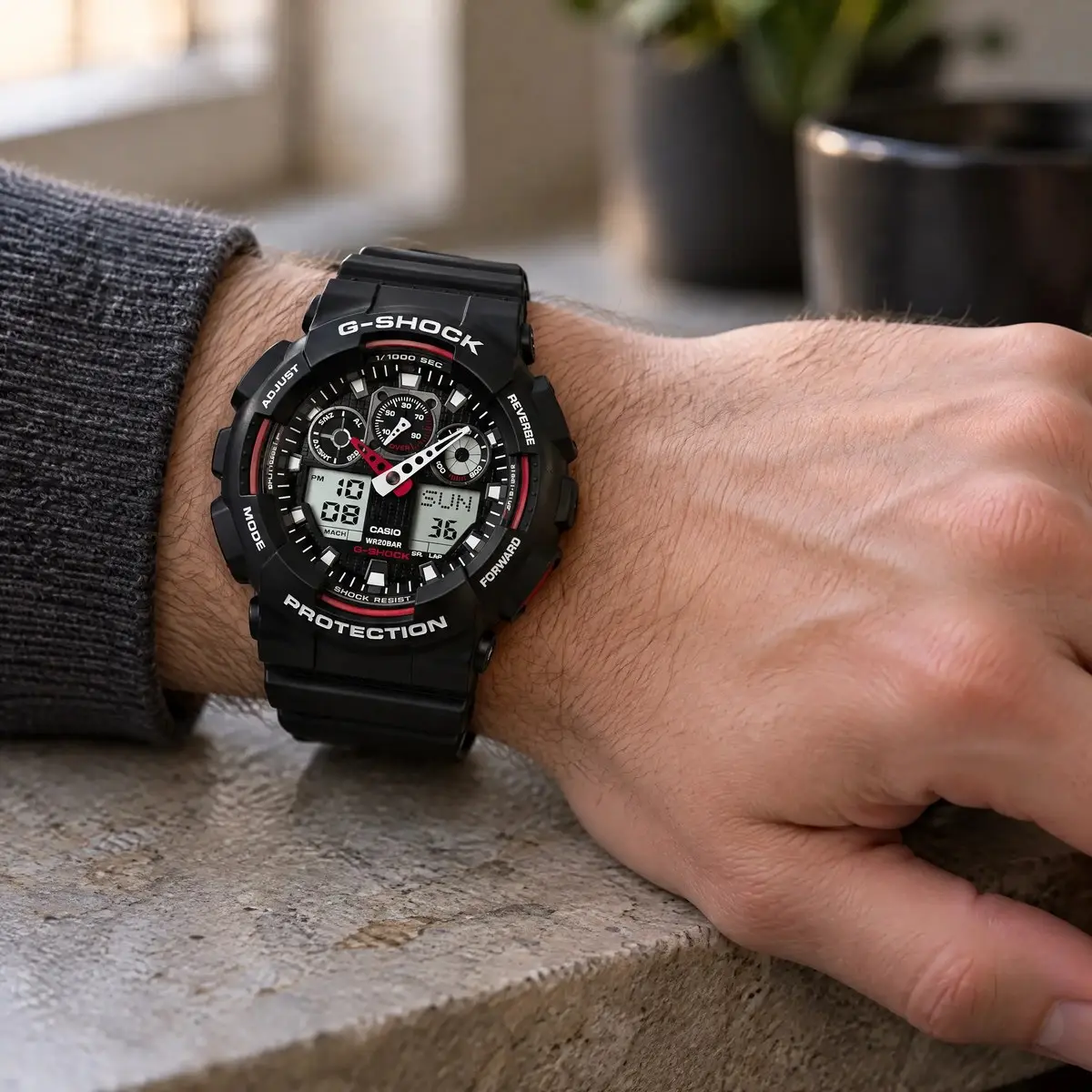 Casio fekete férfi karóra piros részletekkel és kombinált kijelzővel férfi csuklón